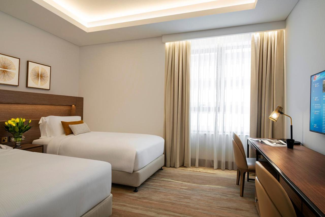 Al Jaddaf Rotana Suite Hotel Dubai Esterno foto