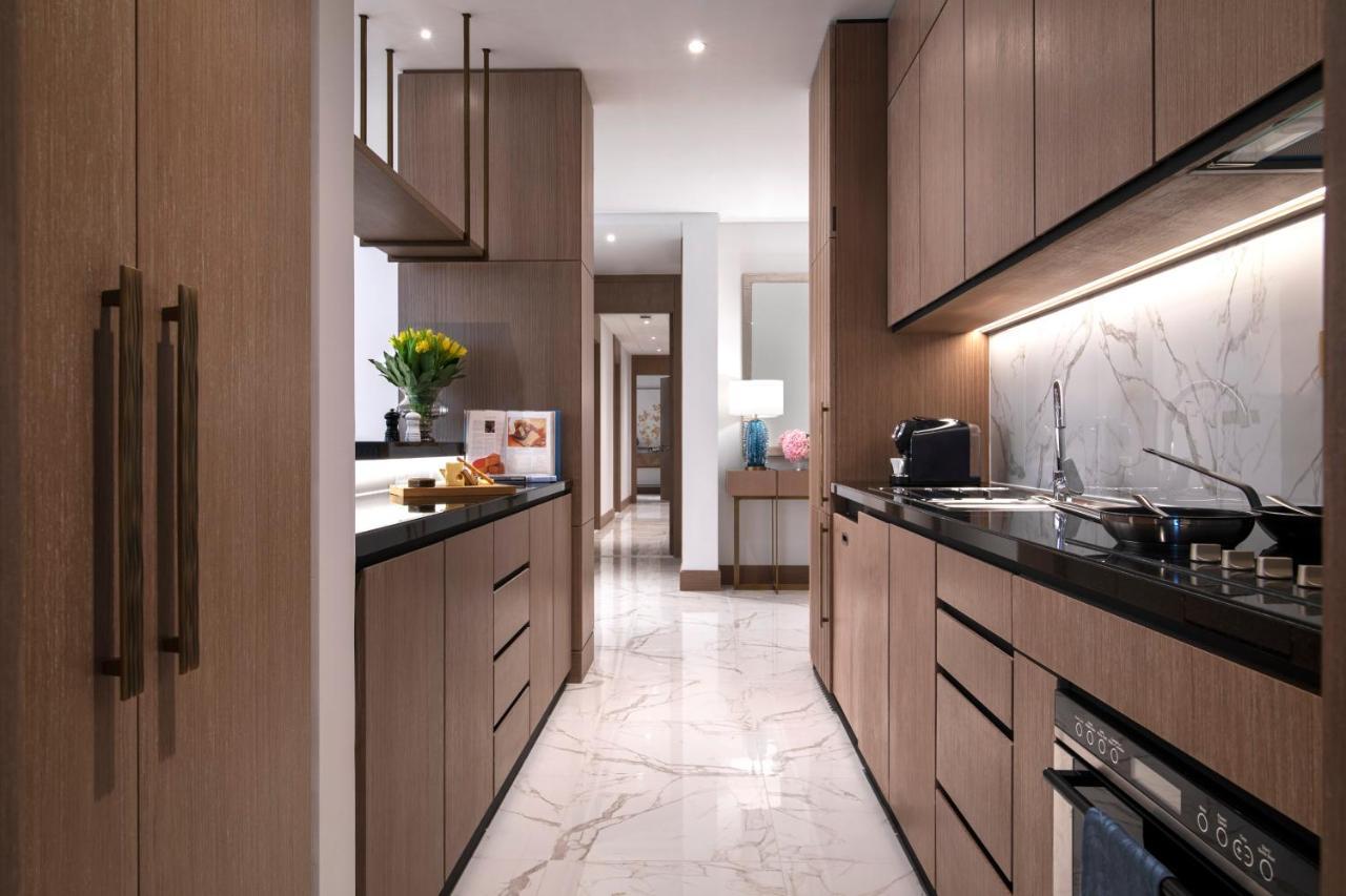 Al Jaddaf Rotana Suite Hotel Dubai Esterno foto The kitchen