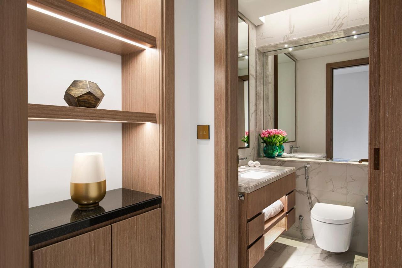 Al Jaddaf Rotana Suite Hotel Dubai Esterno foto Bathroom
