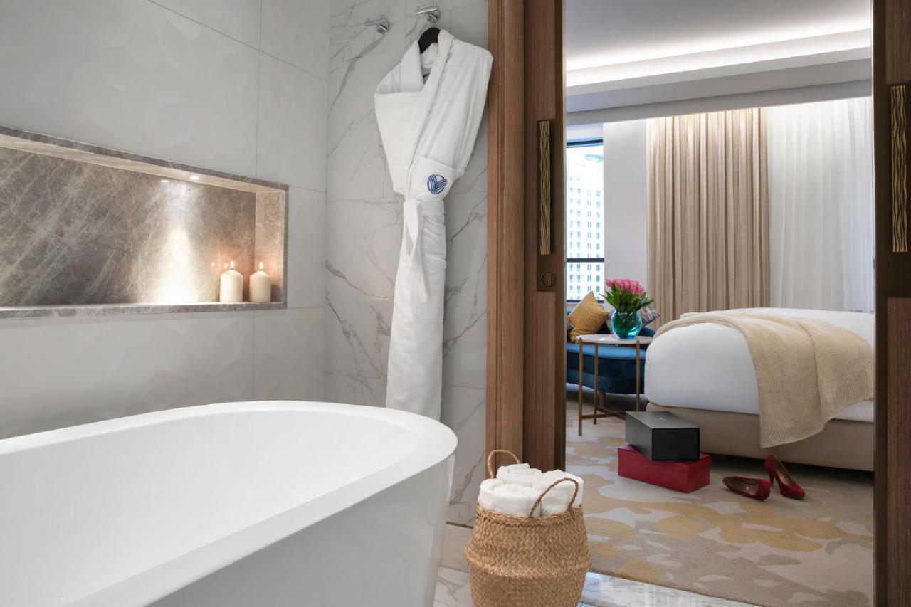 Al Jaddaf Rotana Suite Hotel Dubai Esterno foto A bathroom at the hotel