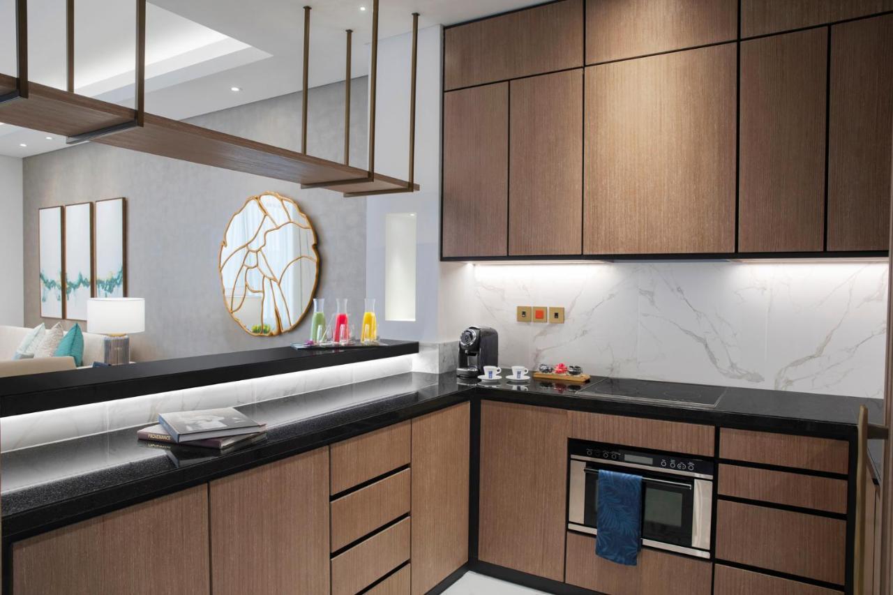 Al Jaddaf Rotana Suite Hotel Dubai Esterno foto A kitchen at The Ivy Collection