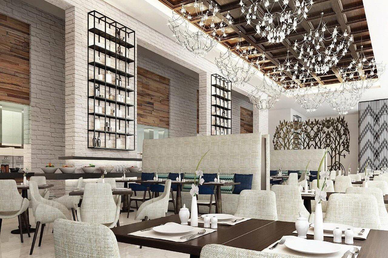 Al Jaddaf Rotana Suite Hotel Dubai Esterno foto The interior of the restaurant