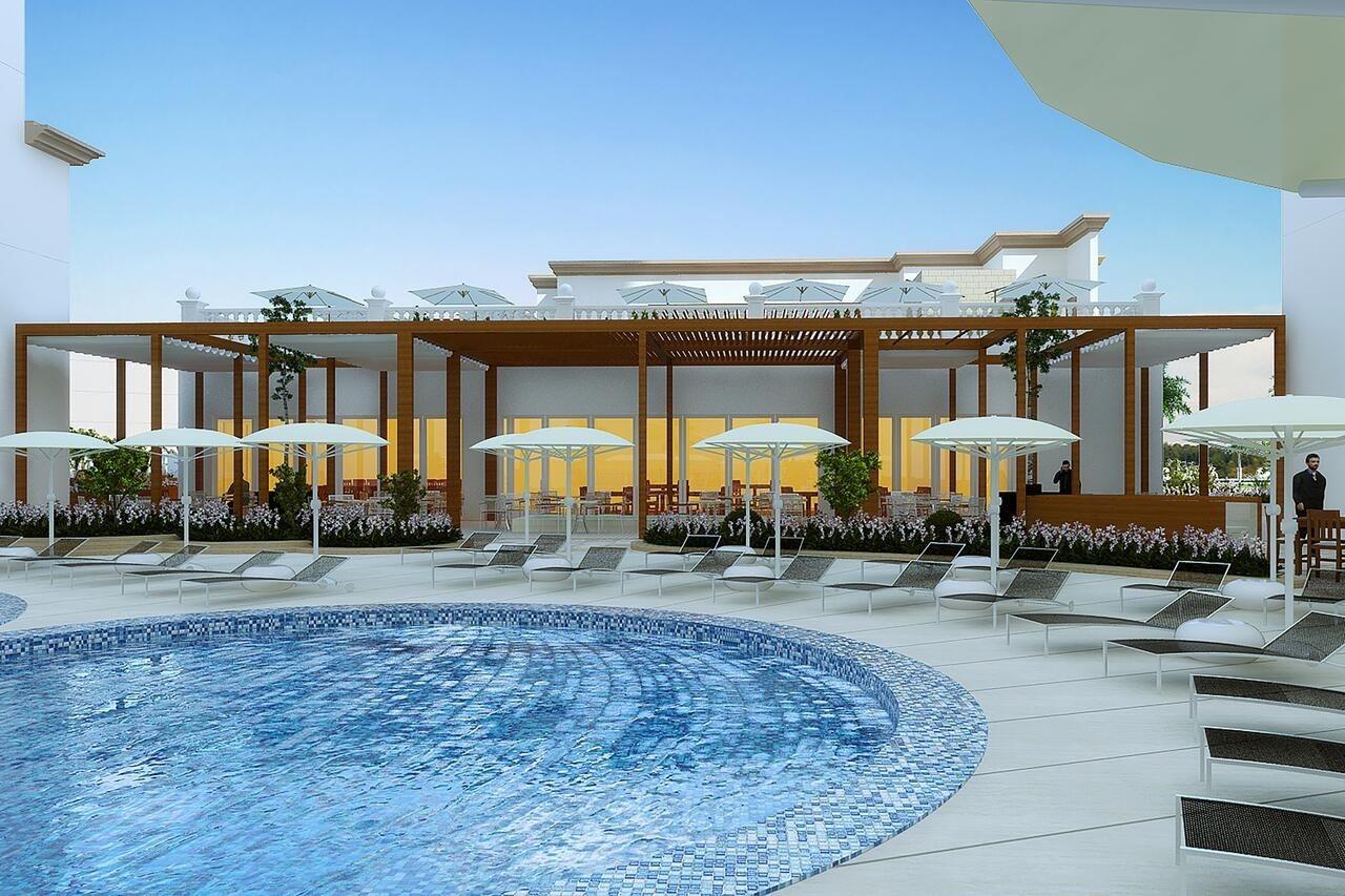 Al Jaddaf Rotana Suite Hotel Dubai Esterno foto The pool at the hotel