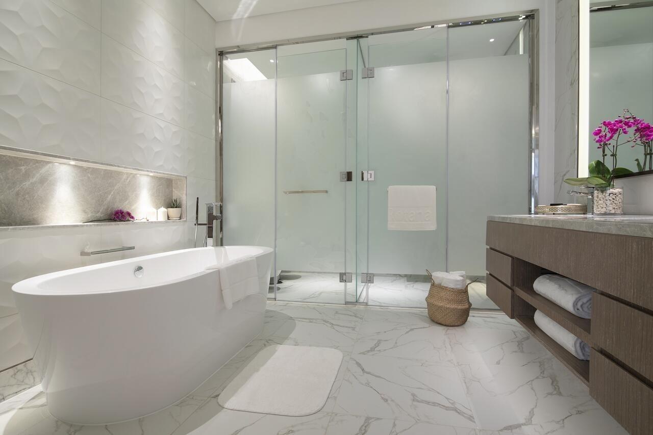 Al Jaddaf Rotana Suite Hotel Dubai Esterno foto A modern bathroom