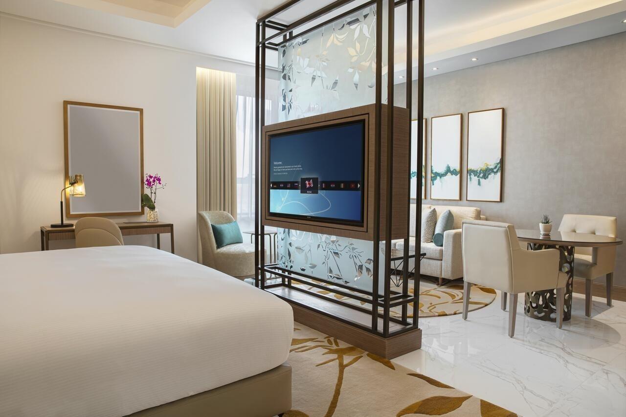 Al Jaddaf Rotana Suite Hotel Dubai Esterno foto A room at the hotel