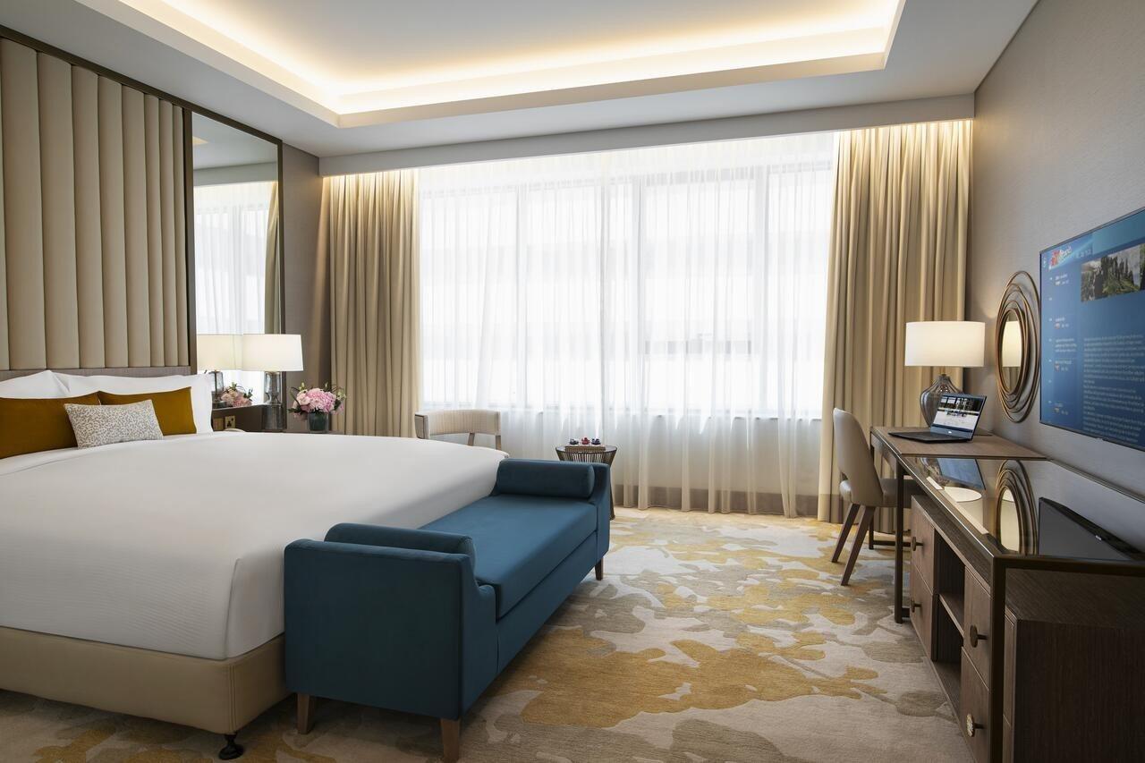 Al Jaddaf Rotana Suite Hotel Dubai Esterno foto Deluxe Room