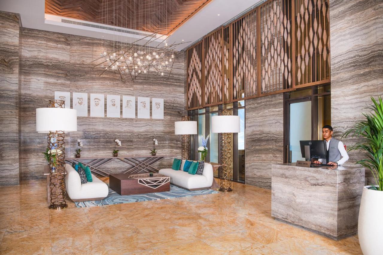 Al Jaddaf Rotana Suite Hotel Dubai Esterno foto Lobby