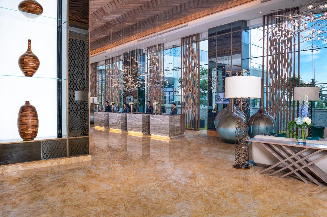 Al Jaddaf Rotana Suite Hotel Dubai Esterno foto Lobby